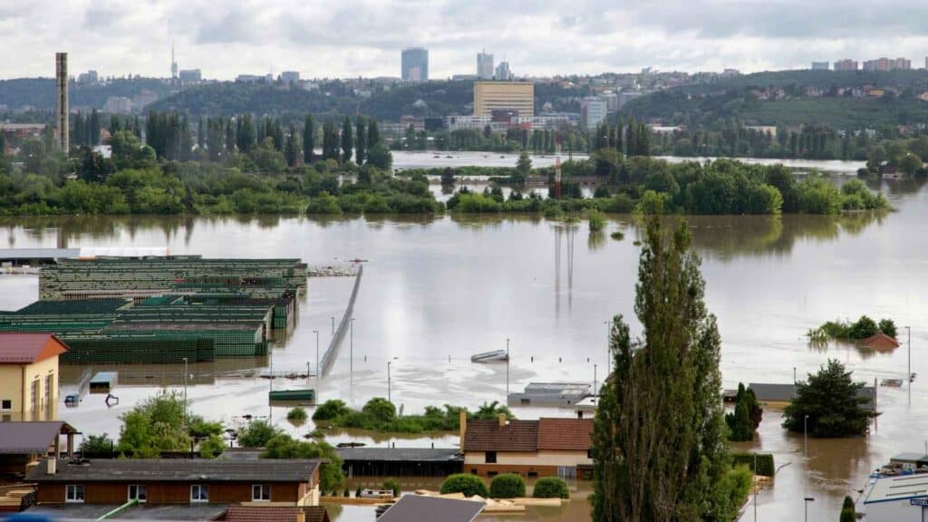 city in valley flooded from heavy rainfall