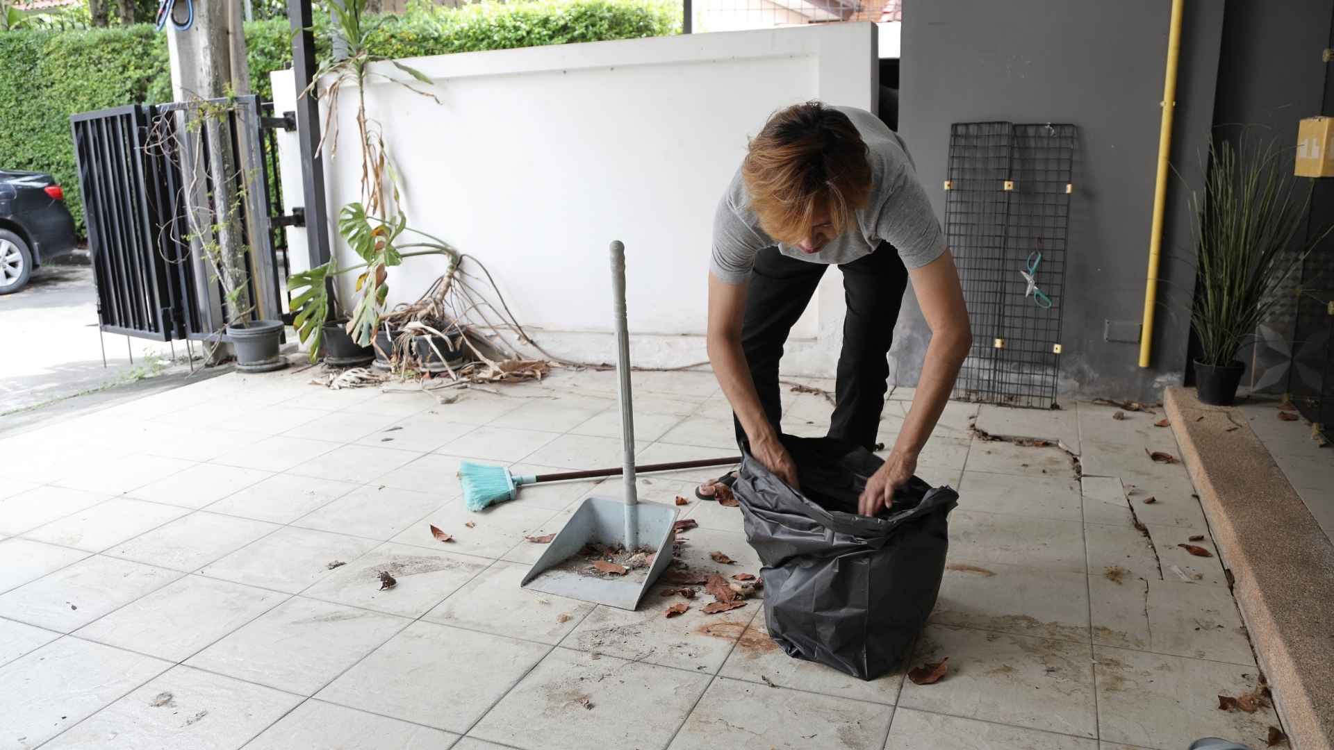 person partaking in spring cleaning