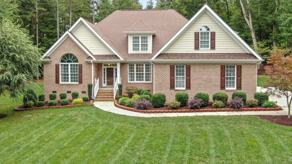 Brick House with Grass Lawn