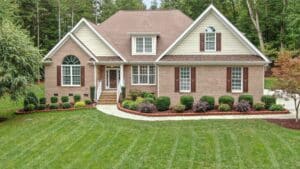 Brick House with Grass Lawn